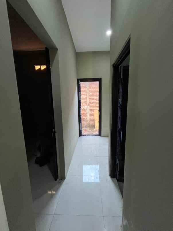 rumah 2 lantai harga 1 lantai