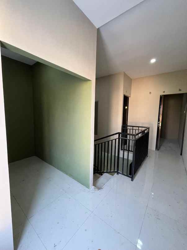 rumah 2 lantai harga 1 lantai