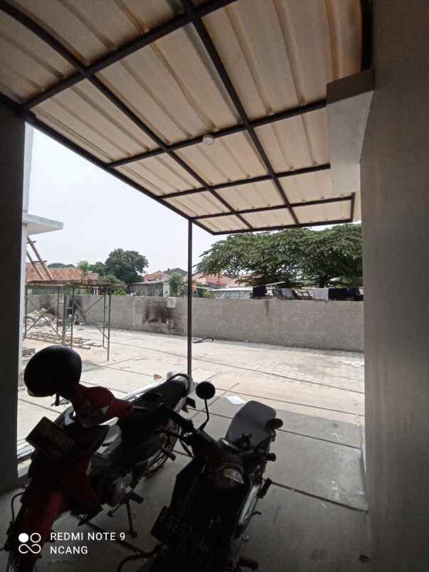 rumah cluster design industrial di pamulang tangsel