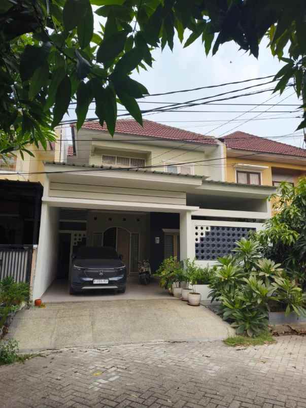 rumah cluster nirwana taman harapan baru bekasi