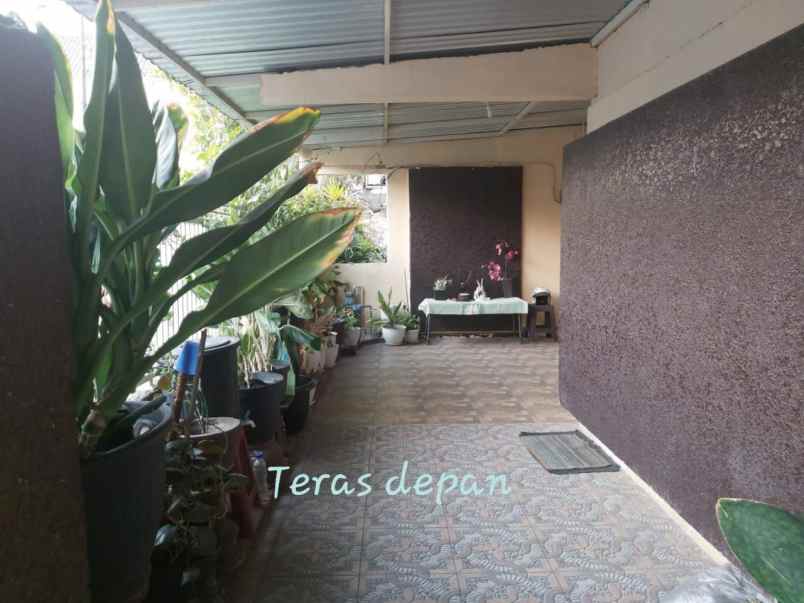 rumah jl pucang asri i row 2 mobil