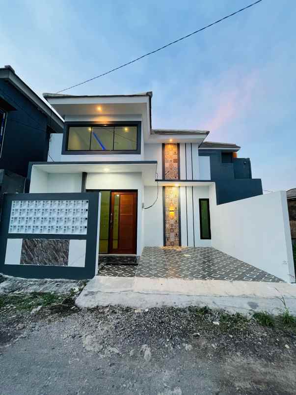 rumah minimalis dibatas kota surabaya barat