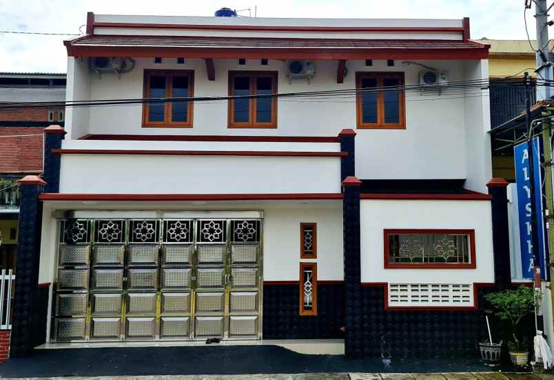 rumah tinggal plus ruang usaha