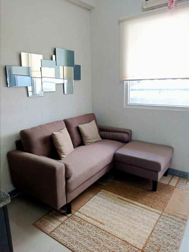 sewa apartment green pramuka city bangunan diatas mall