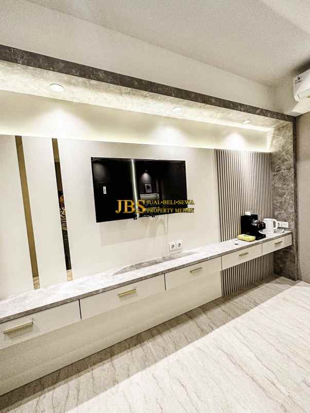 dijual apartemen podomoro city deli tower