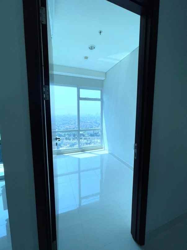 dijual rumah apartemen puri mansion