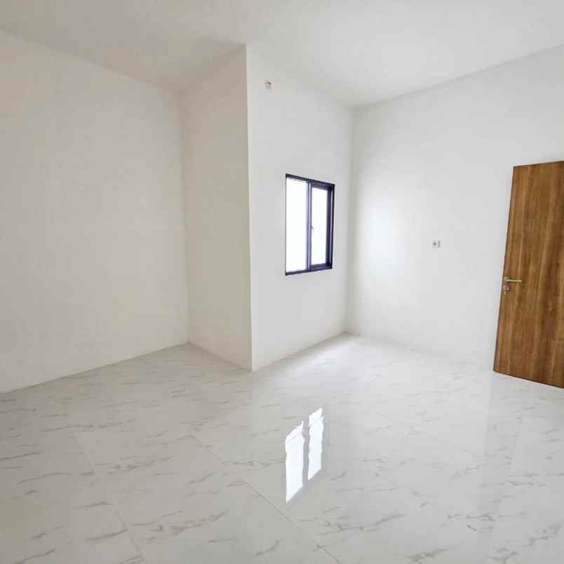 dijual rumah boulevard hijau kota