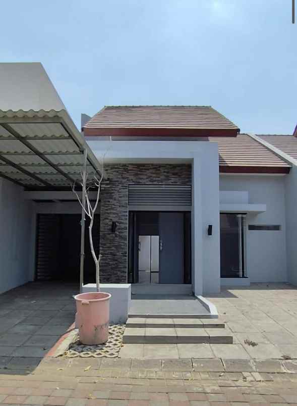 dijual rumah citraland raffles garden