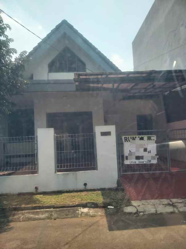 dijual rumah di graha raya bintaro