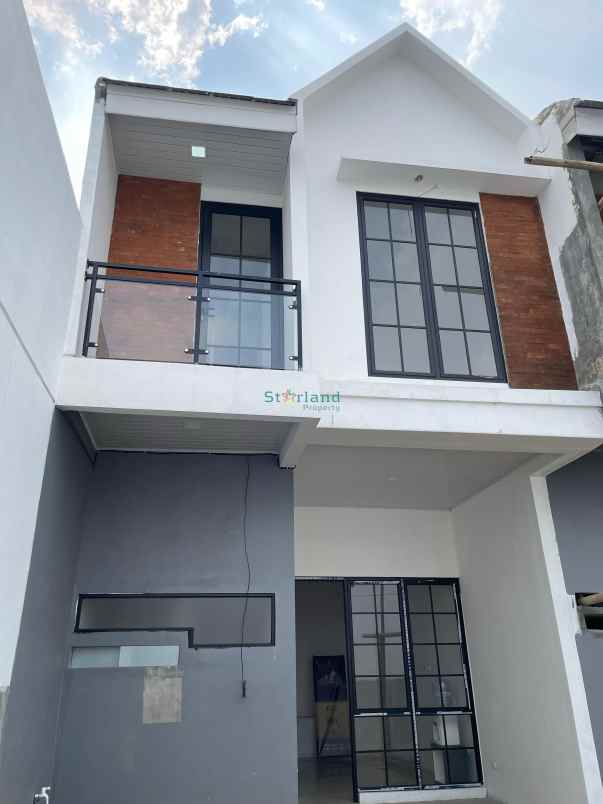 dijual rumah graha raya