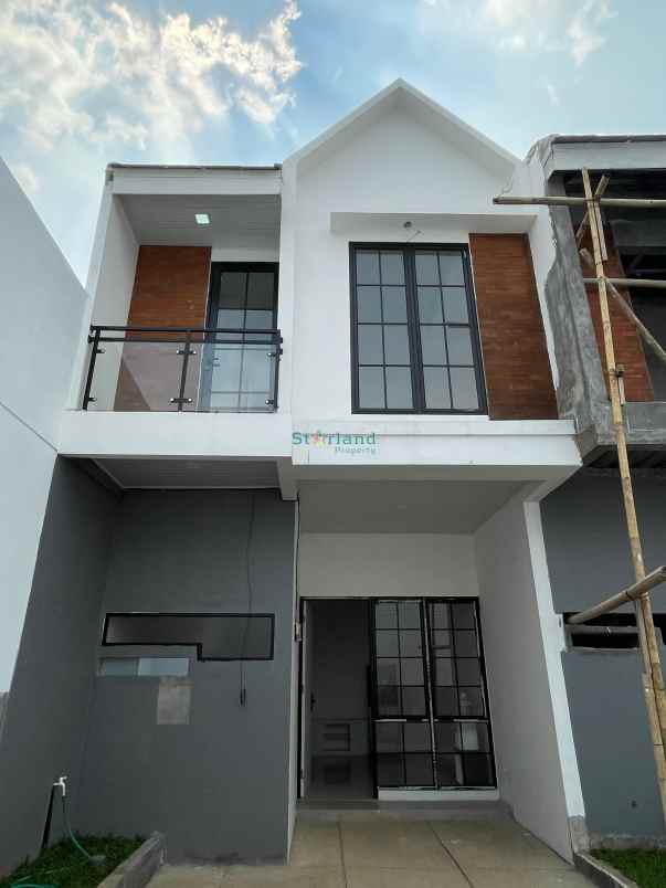 dijual rumah graha raya