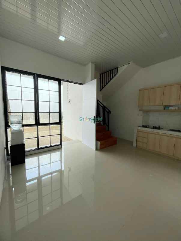 dijual rumah graha raya