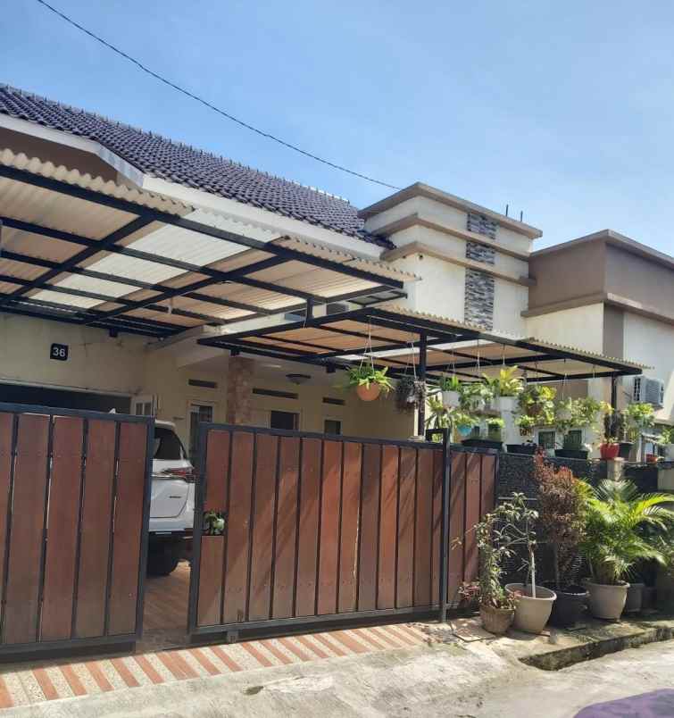 dijual rumah jalan raya mampang