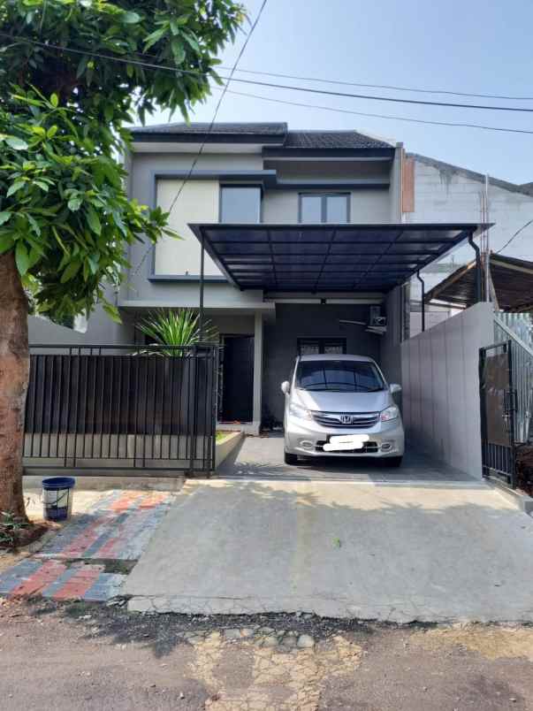 dijual rumah jalan raya mega cinere depok