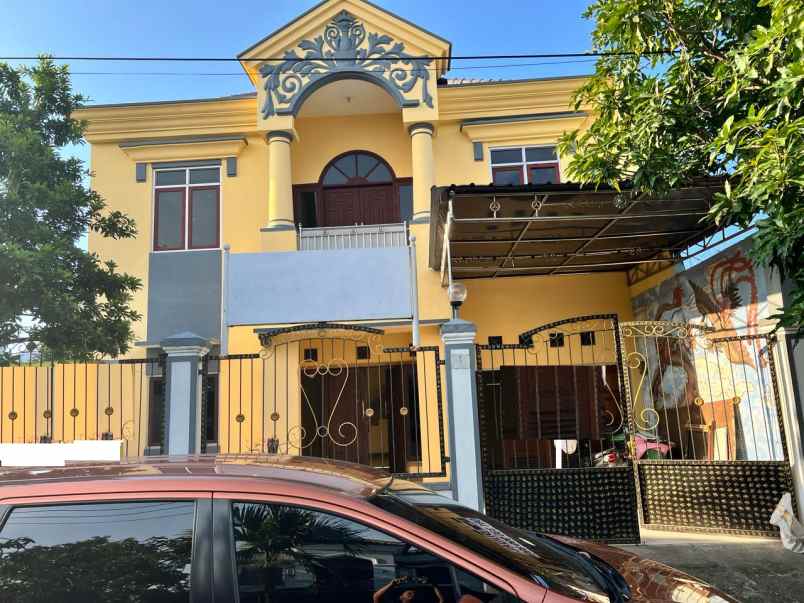 dijual rumah jalan wiguna timur