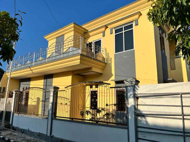 dijual rumah jalan wiguna timur