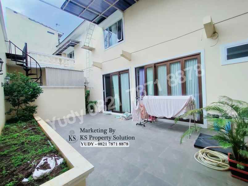 dijual rumah jl opi raya no 23 kec 15