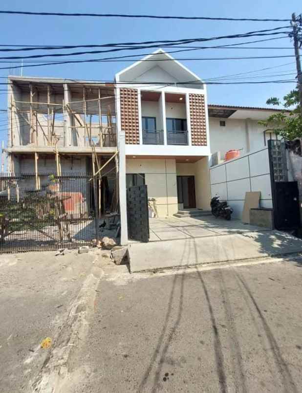 dijual rumah komplek abadi