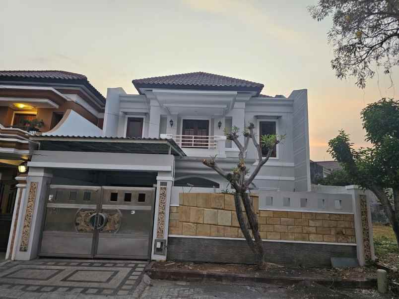 dijual rumah pantai mentari pakuwon