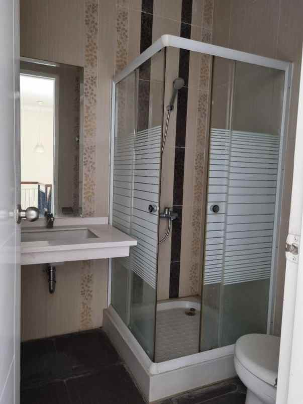 dijual rumah raffles hills cibubur