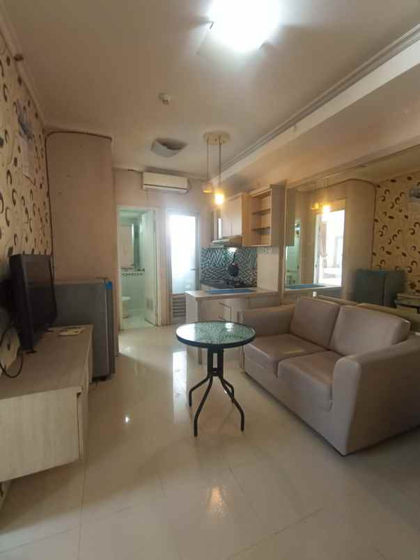 disewakan apartemen grand emerald