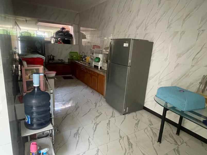 rumah dharmahusada indah utara row 3 mobil