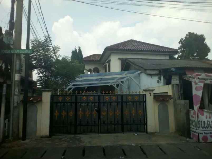 rumah hook pinggir jalan raya pondok kelapa