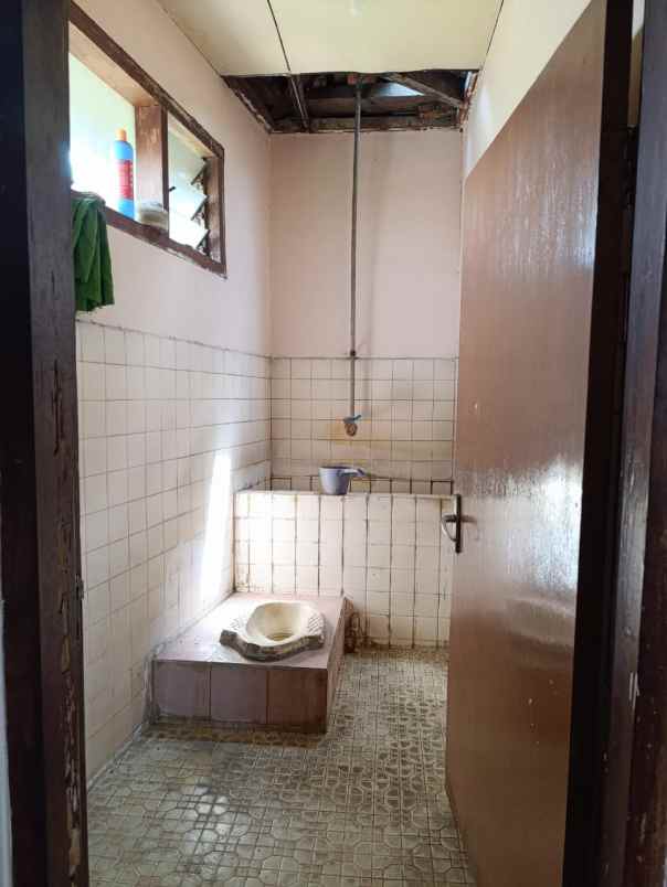 dijual rumah 123 jalan raya alun alun