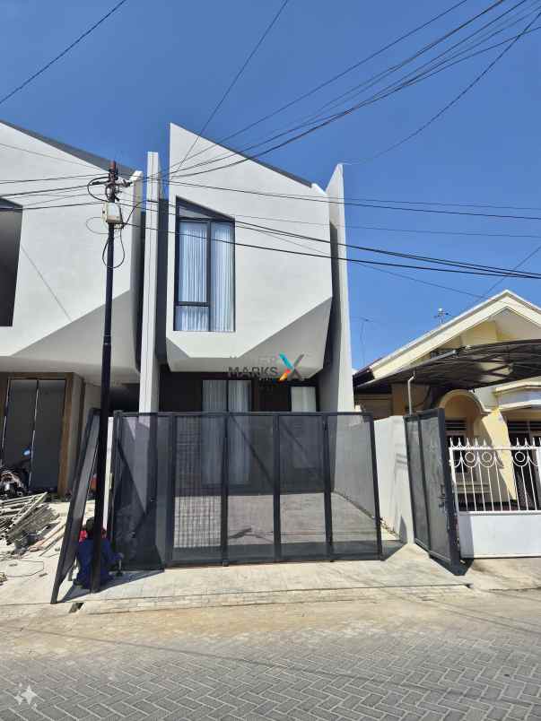 dijual rumah baru di sutorejo semi furnished