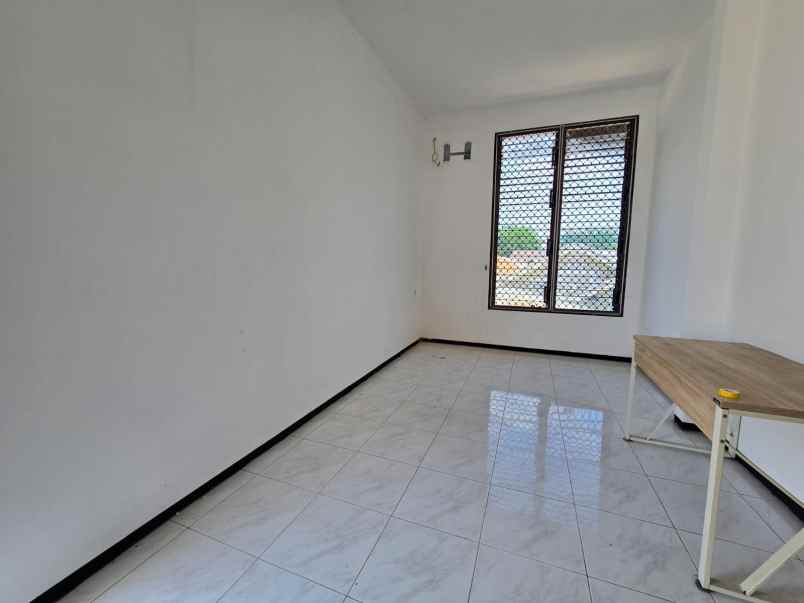 dijual rumah dharmahusada indah