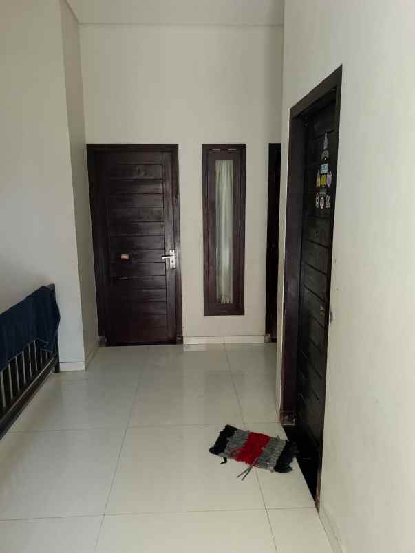 dijual rumah jalan raya muding