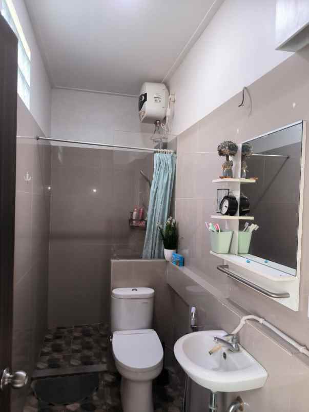 dijual rumah komplek bali garden city view