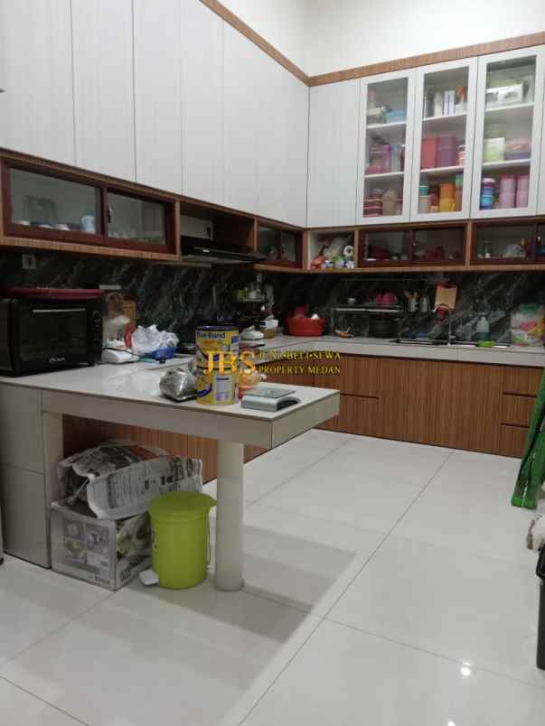 dijual rumah komplek tuasan garden