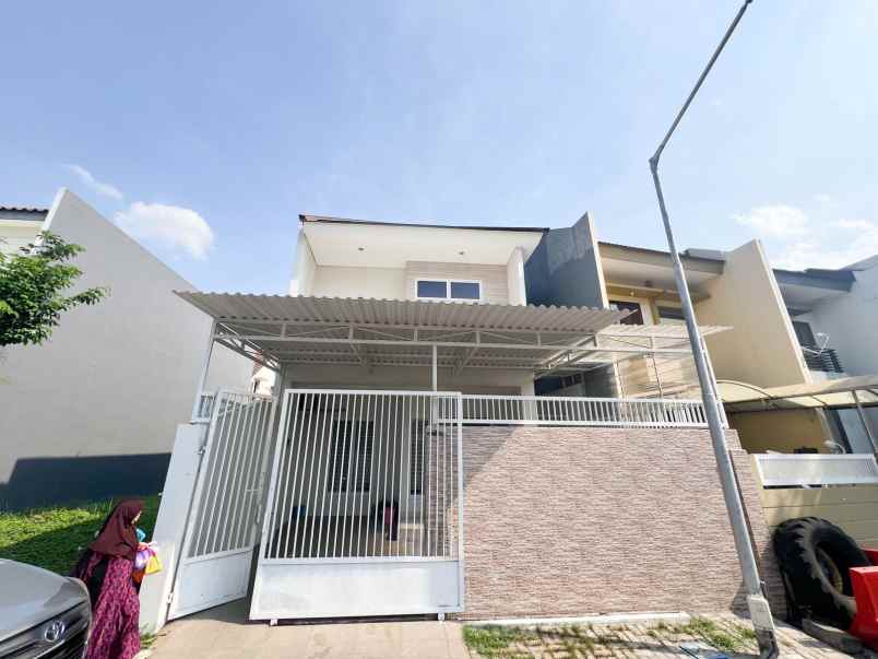 dijual rumah pakuwon indah villa valensia