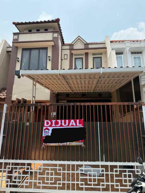 dijual rumah permata buana