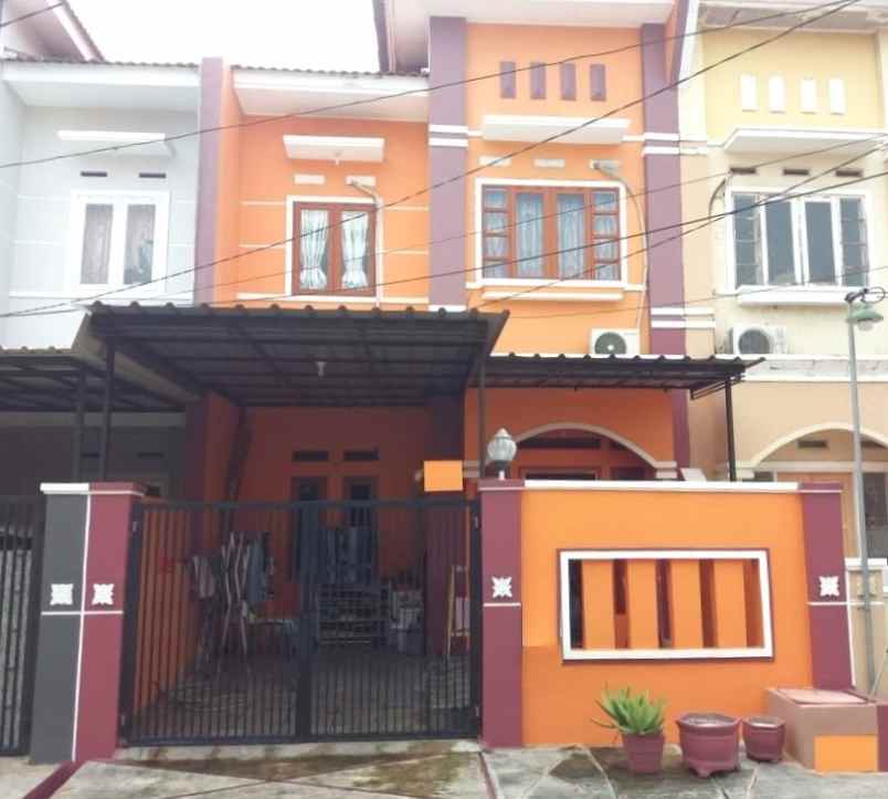 dijual rumah perumahan taman harapan