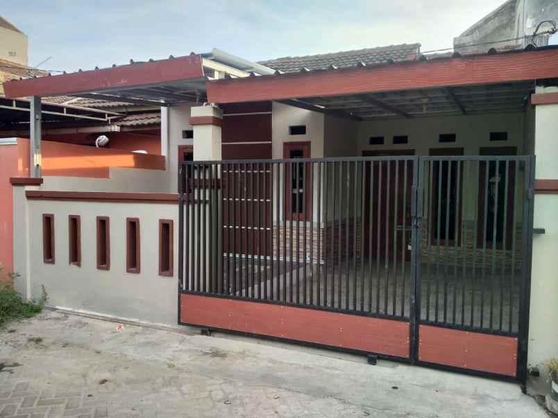 dijual rumah taman harapan baru