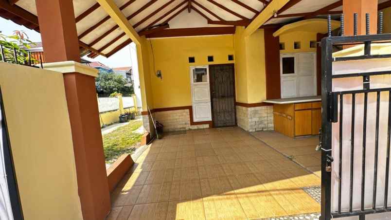 dijual rumah taman harapan baru