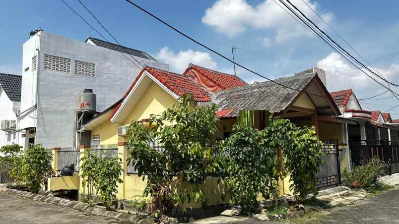dijual rumah taman harapan baru