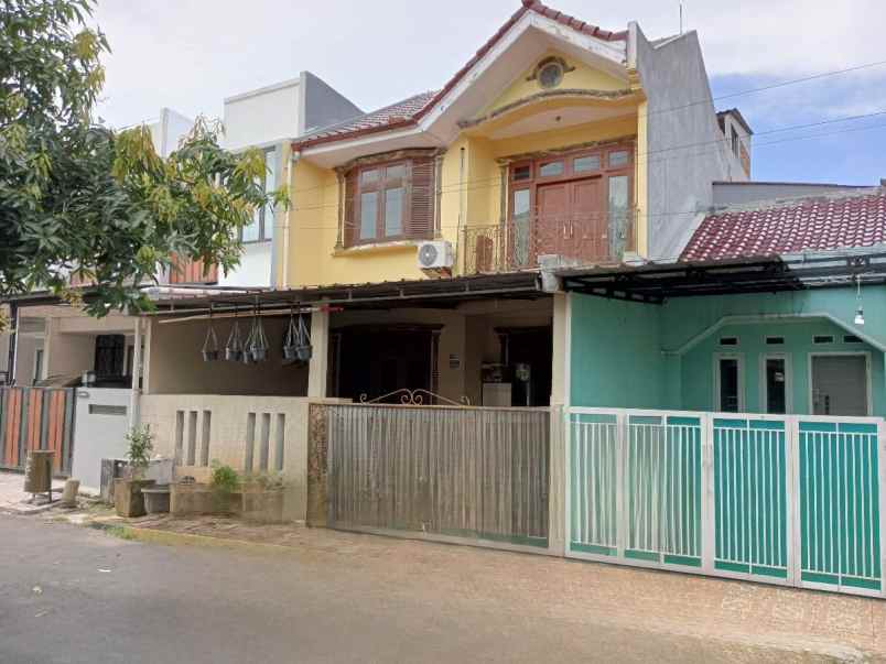 dijual rumah teluk pucung