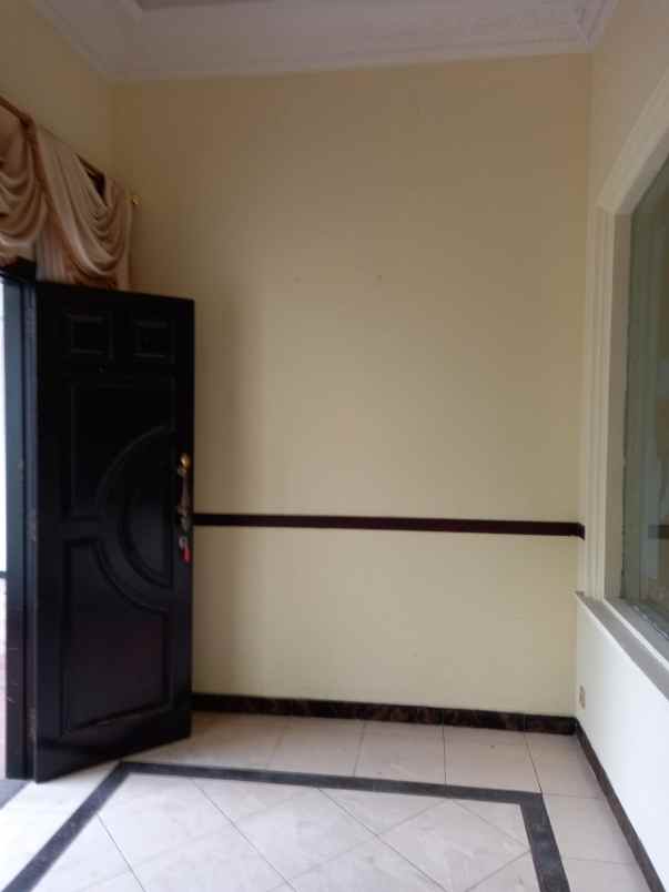 dijual rumah wiguna