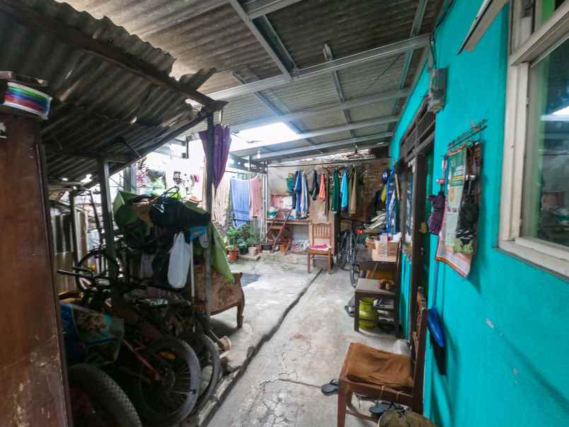 dijual tanah dengan 4 rumah di rambutan jakarta timur