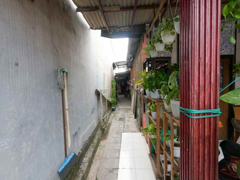 dijual tanah dengan 4 rumah di rambutan jakarta timur