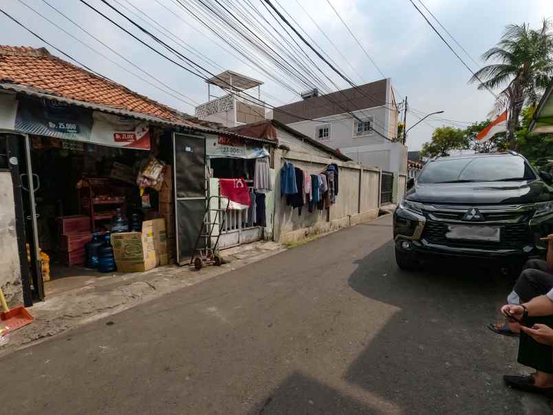 dijual tanah dengan 4 rumah di rambutan jakarta timur