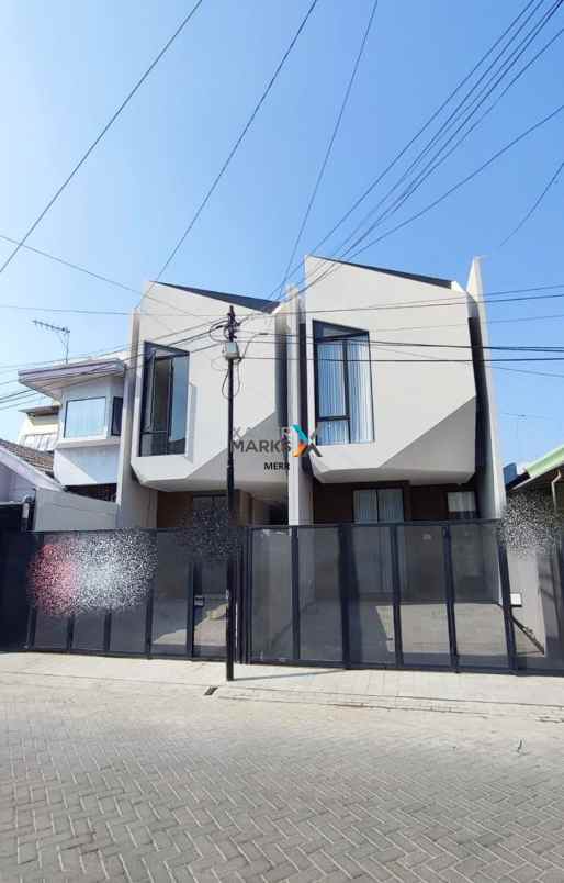 jual rumah baru gress di sutorejo fasad unik