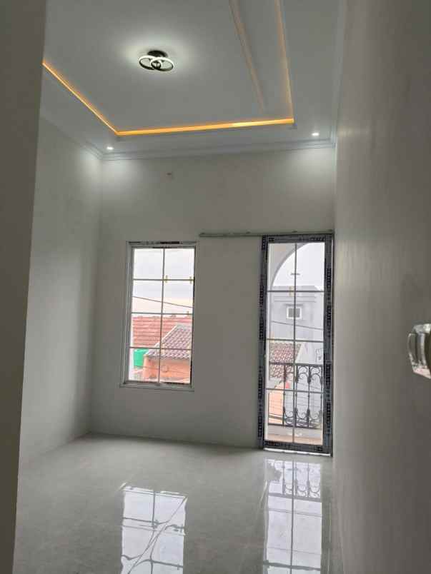 rumah 2 lantai siap huni di tanah baru depok