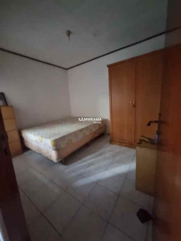 rumah asri 2 lantai strategis di perumnas depok utara