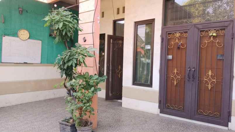 rumah jambangan hadap barat
