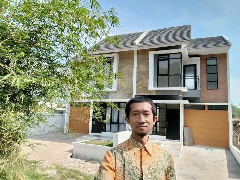 rumah jl cangkring desa jelekong