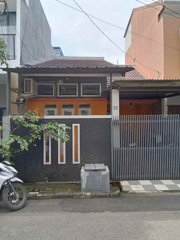 dijual rumah bumi adipura cluster cempaka